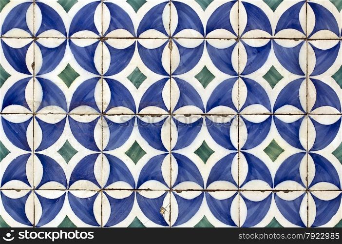Traditional blue colored tiles decorating old Lisbon buildings.