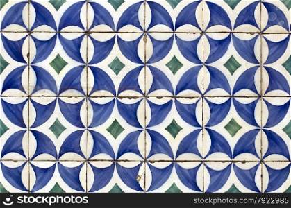 Traditional blue colored tiles decorating old Lisbon buildings.
