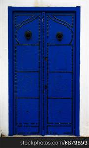Traditional Blue door with ornament from Tunisia Sidi Bou Said