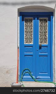 traditional blue greek door in Kalymnos island, Greece