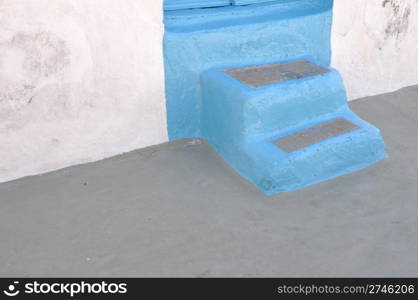 traditional blue greek house stairs in Pserimos island, Greece