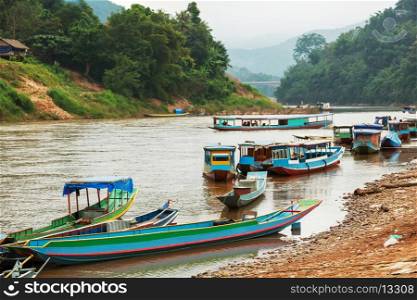 traditional boats in Laos