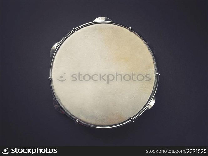 Traditional Brazilian tambourine, Pandeiro, isolated on black background. Brazilian tambourine isolated on black background