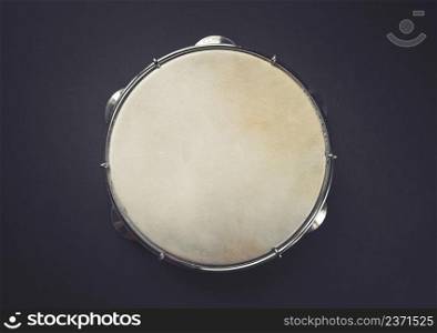 Traditional Brazilian tambourine, Pandeiro, isolated on black background. Brazilian tambourine isolated on black background