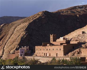 Traditional building in town at mountainside, Ouarzazate, Morocco