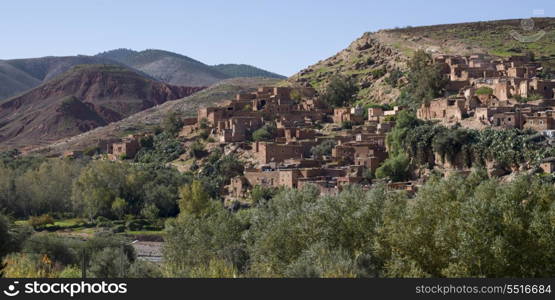 Traditional buildings in town at mountainside, Ouarzazate, Morocco