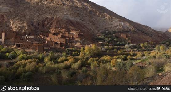 Traditional buildings in town at mountainside, Ouarzazate, Morocco