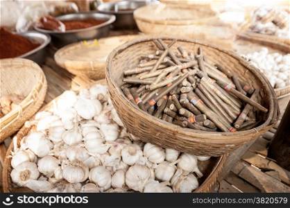 Traditional Burmese hand rolled cigars and spicy garlic selling at marketplace. Bagan, Myanmar