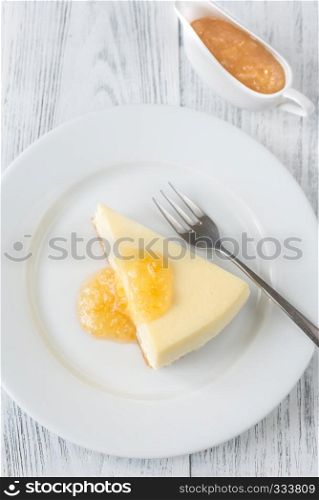 Traditional cheesecake on the wooden table flat lay