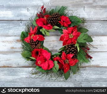 Traditional Christmas wreath on white vintage wood