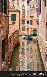 Traditional city canal in Venice and the facades of old buildings on the water.. Venice. City Canal.