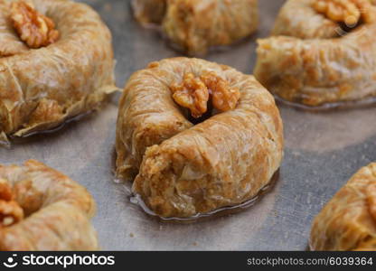 traditional dessert turkish baklava,well known in middle east and delicious isolated on white background