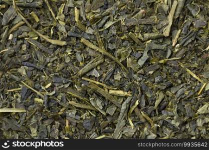 Traditional dried Japanese green tea full frame close up as a background
