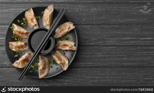 traditional dumplings plate with chopsticks. High resolution photo. traditional dumplings plate with chopsticks. High quality photo