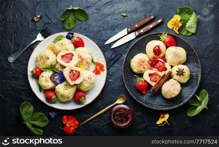 Traditional dumplings with berries.Dumplings with strawberries or knedlik.Czech and Slovak cuisine. Sweet dumplings with strawberries or knedlik