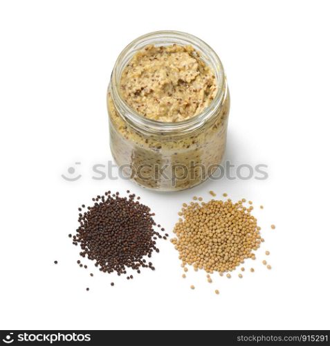 Traditional Dutch mustard with a heap of yellow and brown mustard seed isolated on white background