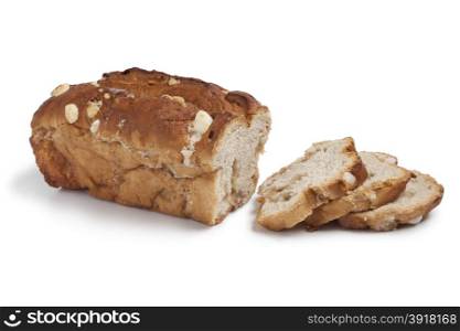 Traditional dutch sugar bread cut into slices on white background