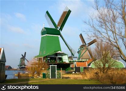 Traditional dutch windmills in the quaint village of Zaanse Schans, the Netherlands