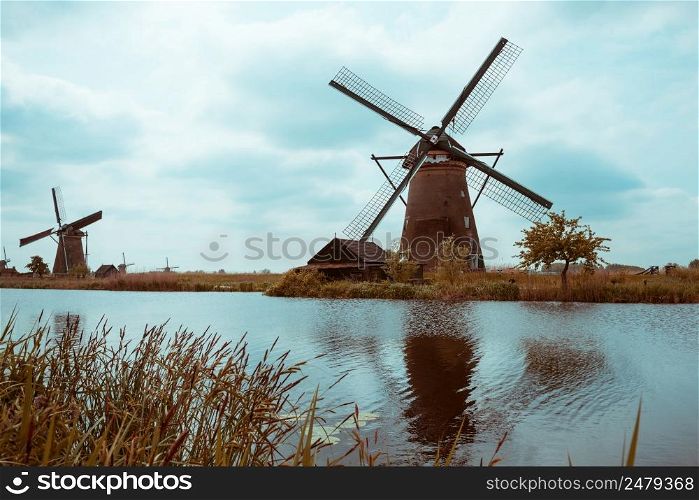 Traditional Dutch windmills retro color stylized