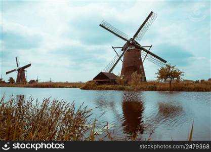 Traditional Dutch windmills retro color stylized