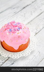 Traditional Easter bread or cake with decorations on wooden table. Traditional Easter bread or cake on wooden table