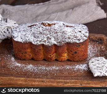 traditional European Stollen cake with nuts and candied fruit
