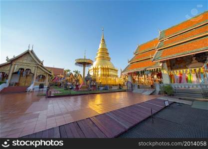 Traditional festival in Harikulchai Temple, Lamphun, Thailand in holidays vacation. Ceremony in Asia. Celebration. Thai architecture. Tourist attraction landmark.