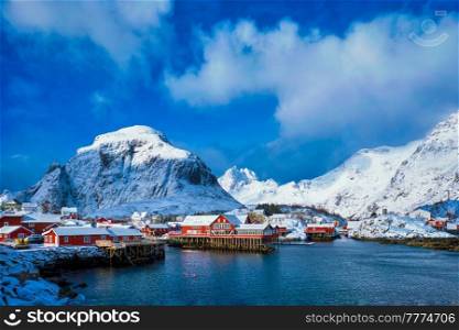 Traditional fishing village A on Lofoten Islands, Norway with red rorbu houses. With snow in winter. "A" village on Lofoten Islands, Norway