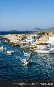 Traditional fishing village on Milos island at Greece. Traditional fishing village with fishing boats on Milos island at Greece
