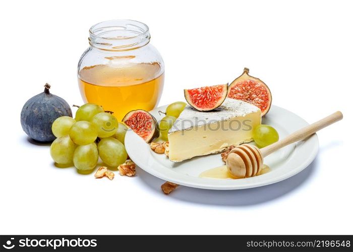 traditional french brie cheese and honey isolated on a white background. traditional french brie cheese and honey on a white background