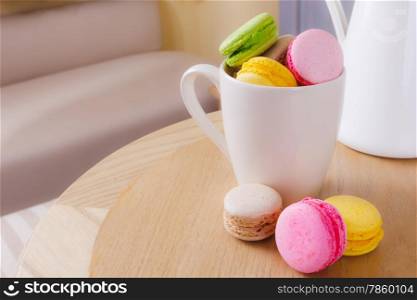 traditional french colorful sweet Macaron in cup
