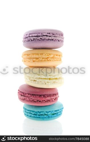 traditional french macaroons stack over white background