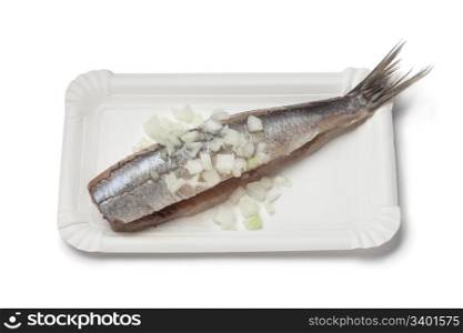 Traditional fresh herring with onions on white background