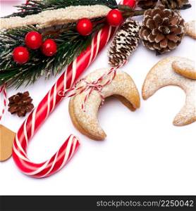 Traditional German or Austrian Vanillekipferl vanilla kipferl cookies and Christmas decorations. High quality photo. Traditional German or Austrian Vanillekipferl vanilla kipferl cookies and Christmas decorations