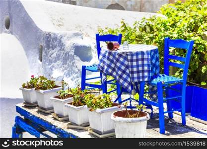 Traditional Greece. Typical street restaurants (taverns) of Greece. Naxos, Cycades.. Cute taverns of Greece. Naxos island
