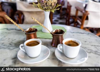 Traditional Greek Coffee in pot and Coffee Cups