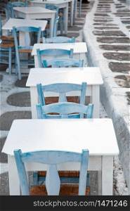 traditional Greek restaurant tables summer holiday concept
