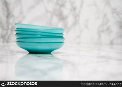 Traditional green Turkish tea plates on white marble background