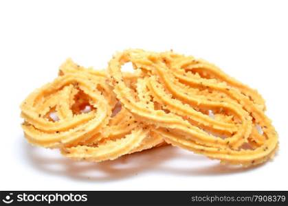 Traditional indian snack - chakali, isolated on white.