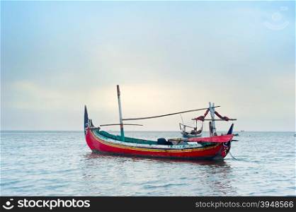 Traditional indonesian fishing boats in the ocean, Java island, Indonesia