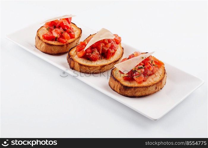 Traditional italian antipasto bruschetta appetizer with cherry tomatoes