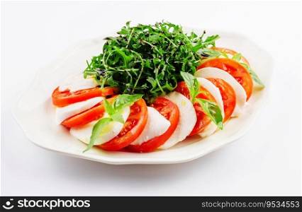 Traditional italian caprice salad tomato mozzarella cheese and basil