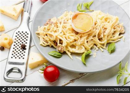 Traditional italian dish spaghetti carbonara with bacon.Dish of spaghetti alla carbonara. Classic Italian pasta carbonara