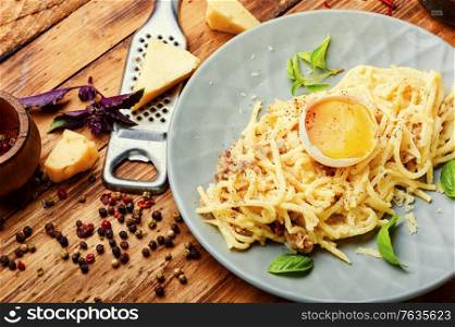 Traditional italian dish spaghetti carbonara with bacon. Homemade pasta carbonara