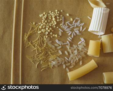 Traditional Italian pasta. Many different kinds of Italian pasta including penne macaroni (maccheroni) fusilli spaghetti trenette (linguine) orecchiette tortiglioni conchiglie (shells) rice and egg pasta