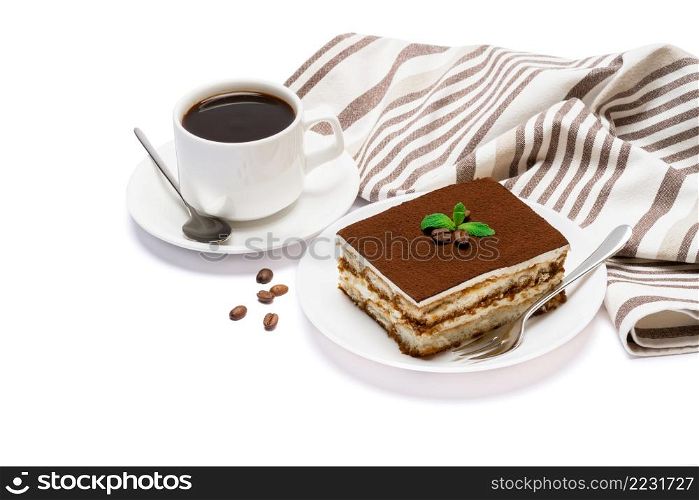Traditional Italian Tiramisu dessert square portion on ceramic plate and cup of fresh espresso coffee isolated on white background. Traditional Italian Tiramisu dessert square portion on ceramic plate and cup of fresh espresso coffee isolated on white