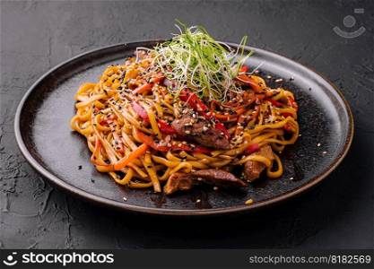 Traditional japanese noodles with vegetables in a plate