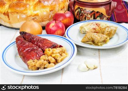 Traditional lenten dishes from the Balkans - dried peppers stuffed with beans and cabbage rolls sarma