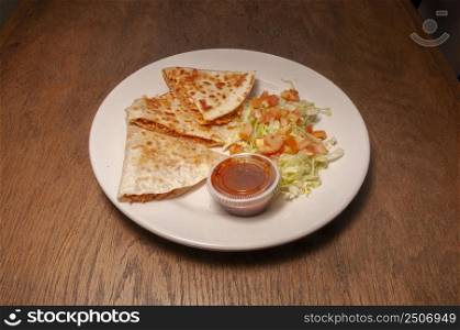 Traditional mexican delicacy known as a chicken quesadilla