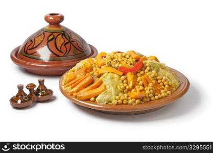 Traditional Moroccan dish with couscous on white background